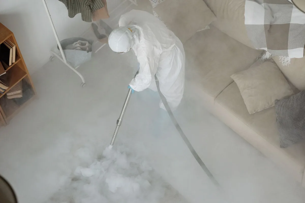 Biohazard cleanup technician in protective equipment, Greenbrier, TN